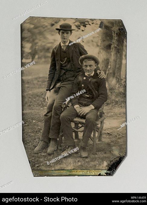 [Two Young Men Outdoors, One Seated, the Other on the Arm of the Chair]. Artist: Unknown (American); Date: 1880s; Medium: Tintype; Dimensions: Image: 9