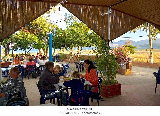 Guests in tavern near Gythio Peloponnese Greece