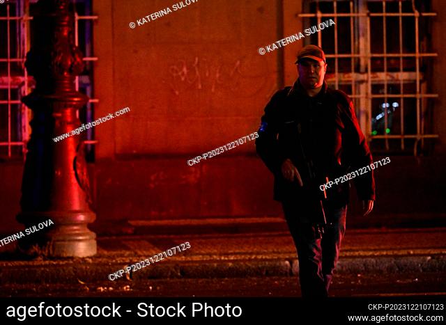 Armed policeman near place, where shots were fired in the Faculty of Arts building, in Prague, Czech Republic, on December 21, 2023
