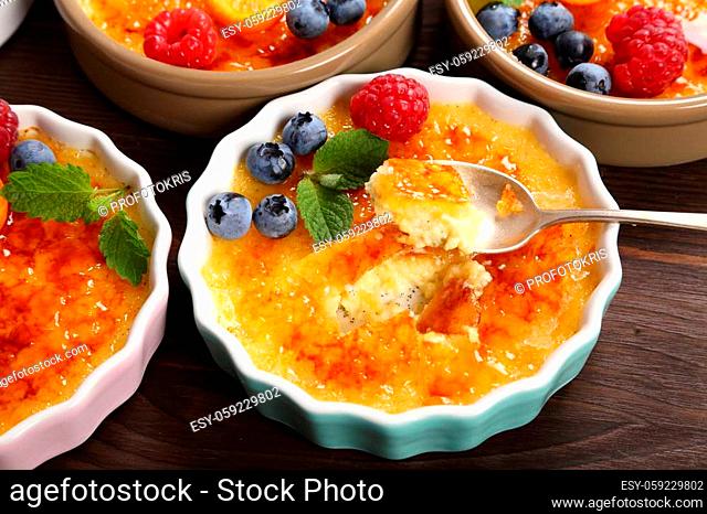 Creme brulee - traditional french vanilla cream dessert with caramelised sugar on top