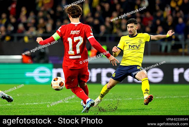 Liverpool's Curtis Jones and Union's Mohamed Amoura fight for the ball during a game between Belgian soccer team Royale Union Saint Gilloise and English club...