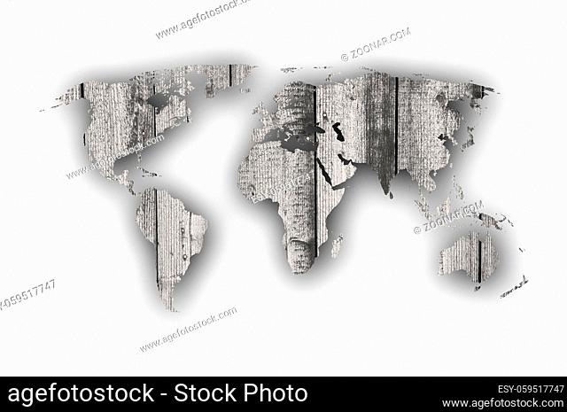 Weltkarte auf verwittertem Holz - Map of the world on weathered wood