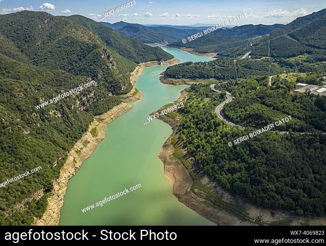 Aerial view of the Baells reservoir with a very low level (36%) during the summer drought of 2022 (Berguedá , Barcelona, Catalonia, Spain)