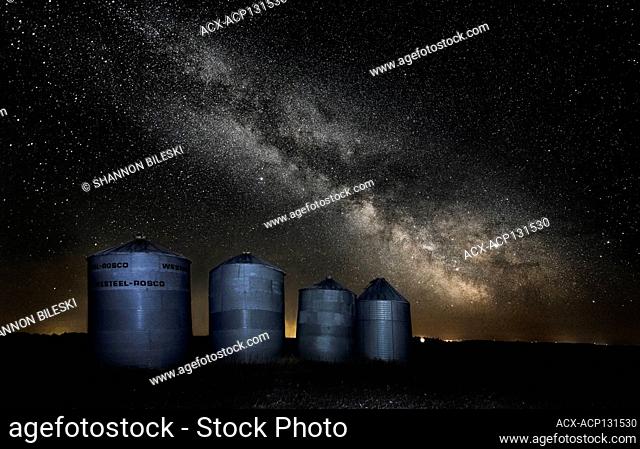 Milkyway over grain bins in rural Manitoba Canada