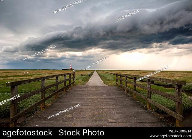 Germany, Schleswig-Holstein, North Sea, Thunderstorm over the Lighthouse Westerheversand