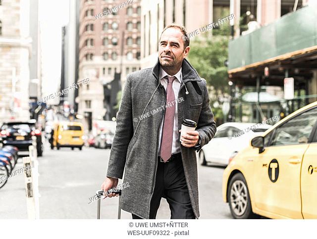 USA, New York City, businessman on the move in Manhattan