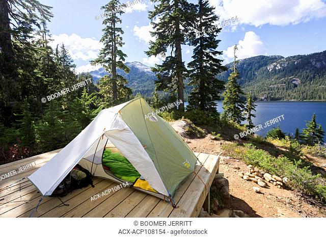 A tent setup overlooks Bedwell Lake in Strathcona Park on Central Vancouver Island. Strathcona Park, Vancouver Island, British Columbia, Canada