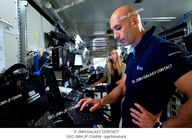 European Space Agency astronaut Luca Parmitano, Expedition 3637 flight engineer, participates in an electrical power system training session in the Space...