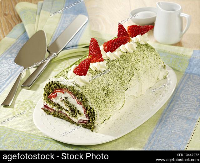Green matcha sponge roll with a strawberry mascarpone filling