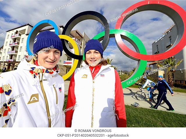 Speedskaters Martina Sablikova (left) and Karolina Erbanova pose in front of the Czech Olympic House in Olympic Venue in Sochi, Russia, on February 4, 2014