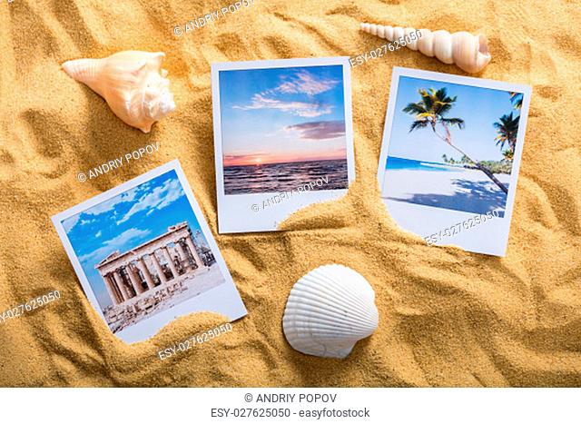 High Angle View Of A Vacation Photos On Sandy Beach