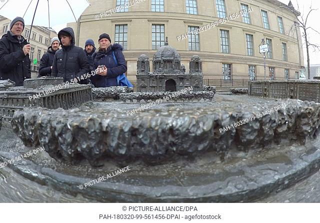 20 March 2018, Germany, Berlin: People standing by the expanded tactile model of the Museumsinsel (lit. museum island) by sculptor Egbert Broerken at the...