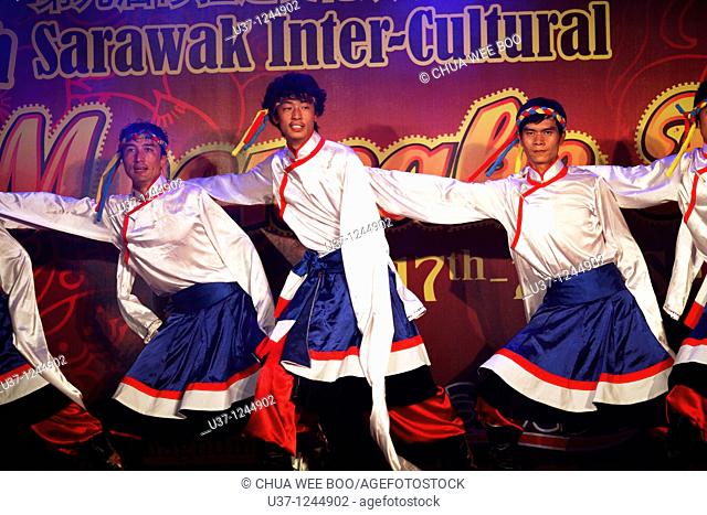 Xin Jiang dancers from China performing in Sarawak Intercultural Show taken at Carpenter Street, Kuching, Sarawak, Malaysia during Mooncake Festival