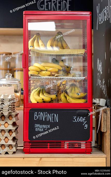 Bananas are in a refrigerator. Detail from an unwrapped shop