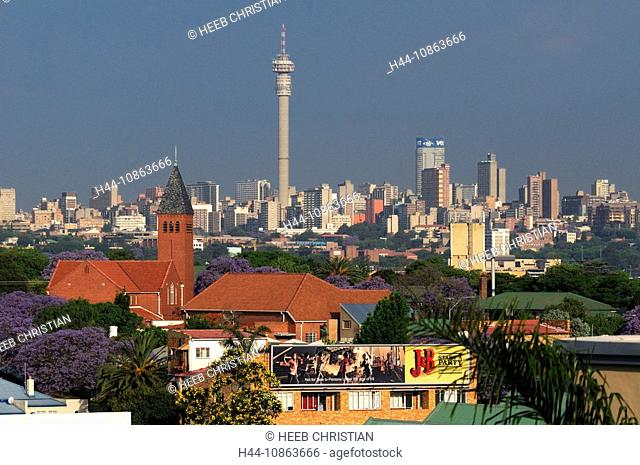 Johannesburg, Gauteng, South Africa, Hillbrow Tower, Jacaranda trees, bloom, flowering, roofs, overlook, overview, green, gardens, city