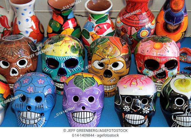 Mexico, Yucatán Peninsula, Quintana Roo, Cancun, business, Mercado 28, souvenirs, shopping, vendor stall, clay masks, vases, skeletons, calaveras, tradition