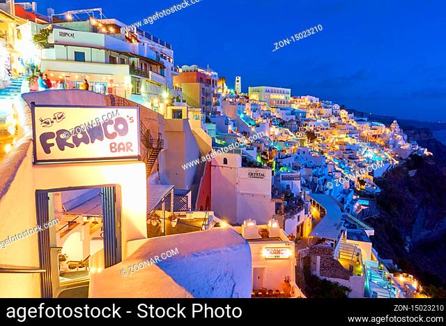 Thira, Santorini, Greece - April 23, 2018: Thira town in Santorini at night
