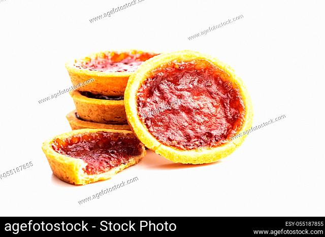 Sweet biscuits with strawberries jam isolated on white background
