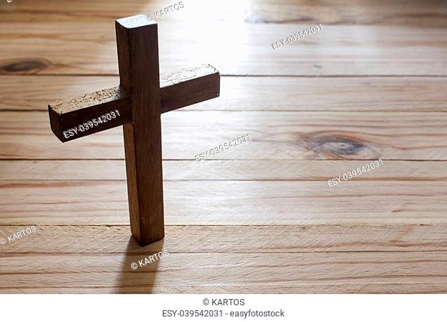 Cross over wood table with window light