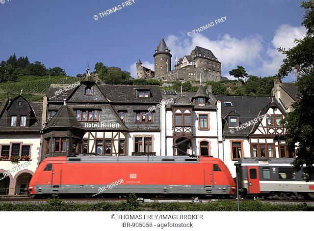 Train passing by Stahleck Castle, Bacharach, Rhineland-Palatinate, Germany, Europe