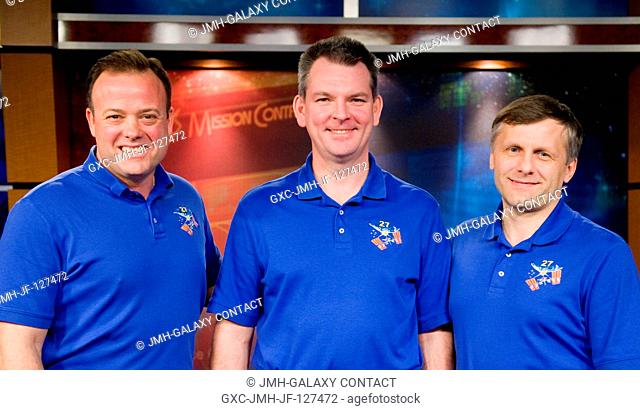 Russian cosmonaut Andrey Borisenko (right), Expedition 27 flight engineer and Expedition 28 commander; Russian cosmonaut Alexander Samokutyaev (center) and NASA...