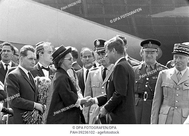 US president John F. Kennedy after his arrival on the military section of the airport Tegel in Berlin on 26 June 1963. From right the allied commanders David...