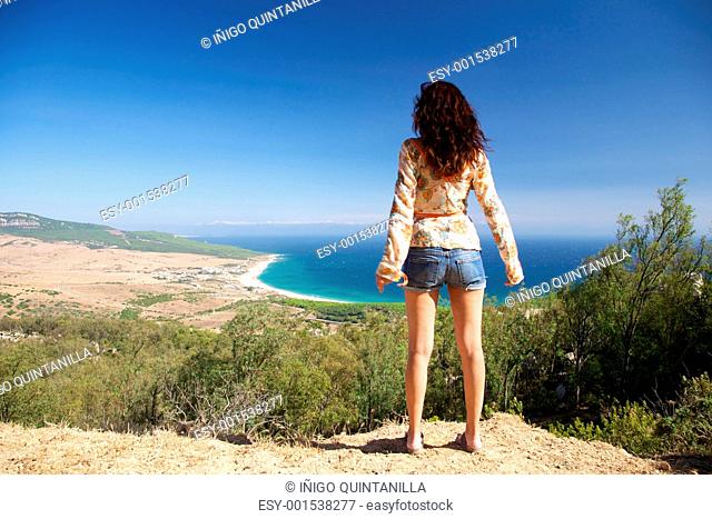 woman looking at Bolonia beach