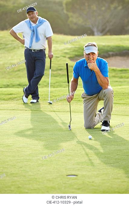 Senior men on golf course