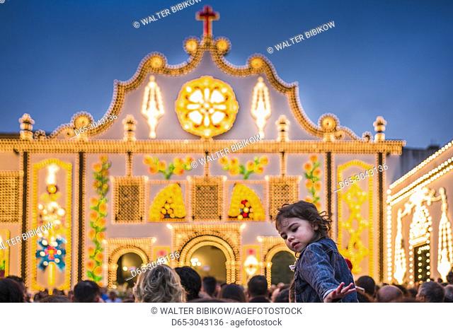 Portugal, Azores, Sao Miguel Island, Ponta Delgada, Festa Santo Christo dos Milagres festival, Igreja Nossa Senhora da Esperanca church lit for the festival