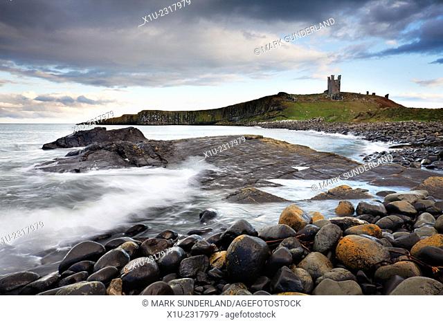 Greymare Rock and Dunstanburgh Castle Northumberland Coast England