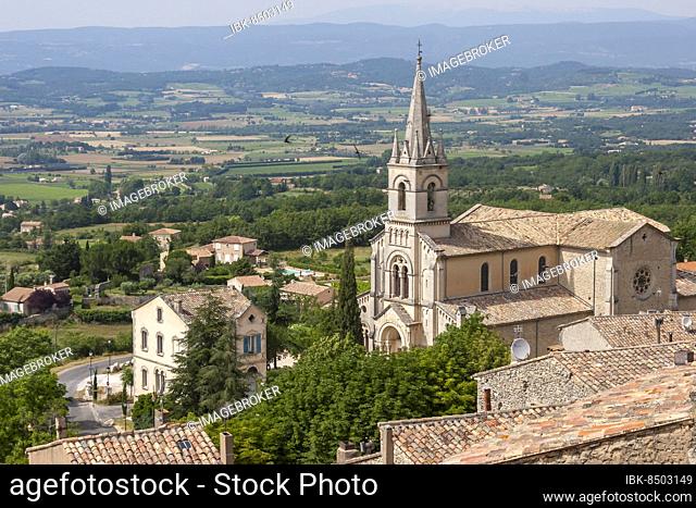 Village view with the church église haute, Holy Cross Church, Bonnieux, Provence, Provence-Alpes-Côte dAzur region, France, Europe