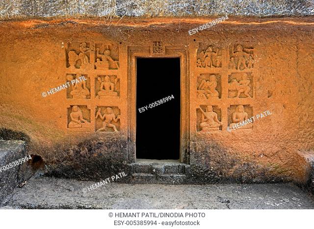 Entrance with sculptured panels of Nath Siddhas cave number fourteen circa 13th centaury AD in Panhale Kazi caves ; Konkan ; Maharashtra ; India