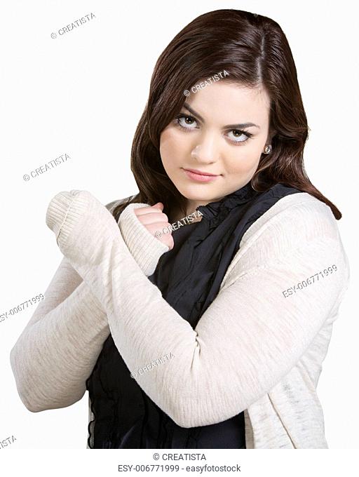 Skeptical lady with wrists crossed on white background
