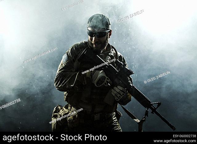 Green Berets US Army Special Forces Group soldier in the rain