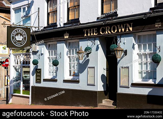 EAST GRINSTEAD, WEST SUSSEX, UK - APRIL 20 : View of the Crown public house in the High Street, East Grinstead on April 20, 2020
