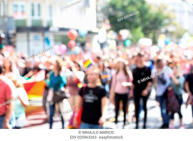 Blurred picture of participants of LGBT parade