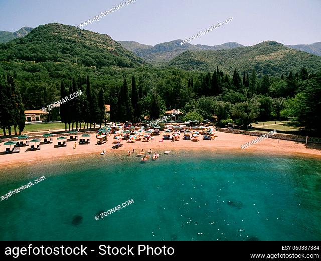 View of the royal beach of Przno, green mountain slopes and forest. High quality photo