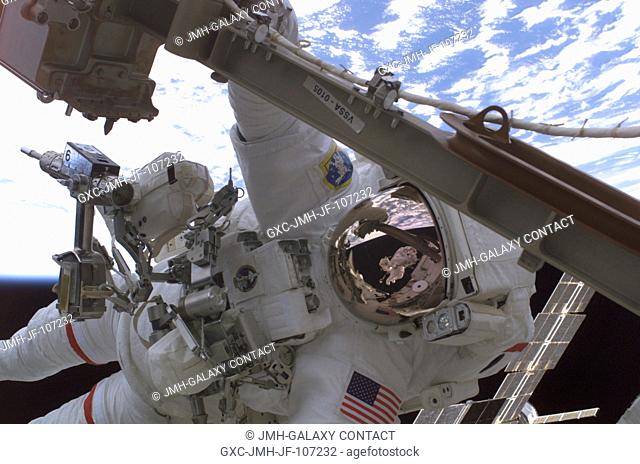 Astronaut Robert L. Curbeam, Jr., STS-116 mission specialist, participates in the mission's first of three planned sessions of extravehicular activity (EVA) as...