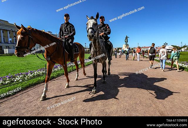 RUSSIA, ST PETERSBURG - AUGUST 15, 2023: Mounted police officers of the Russian Interior Ministry's patrol-guard service are seen in Senate Square