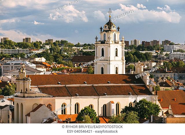 Vilnius, Lithuania. View Of Bell Tower And Church Of St. Johns, St. John The Baptist And St. John The Apostle And Evangelist In Old Town