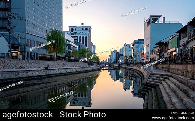 Naka river with Hakata city skyline in Fukuoka, Japan