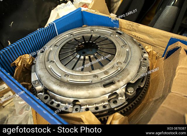 MILAN, ITALY: Detail of Car clutch spare part in a workshop