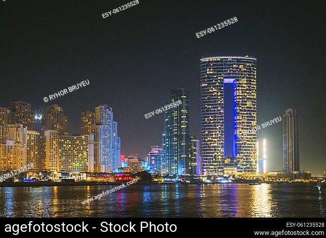 Dubai Marina Port, UAE, United Arab Emirates - Night view of high-rise buildings of residential district in Dubai Marina