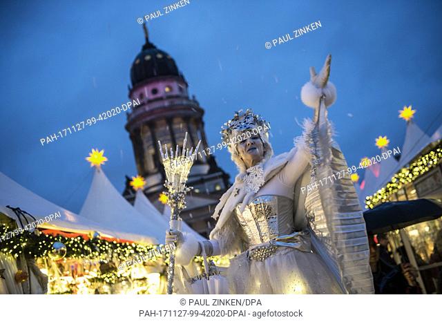 The snow queen greets visitors at the Gendarmenmarkt Christmas market in Berlin, Germany, 27 November 2017. The Christmas market in front of the the Konzerthaus...