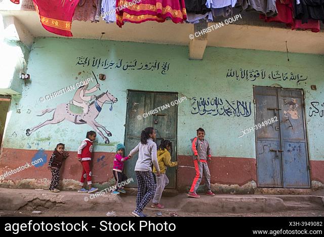 Children in a street of the village of Ramadi, west bank of the Nile south of Edfu, Egypt, North East Africa