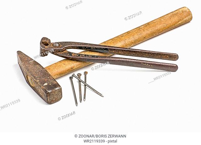 Hammer and nails with pliers
