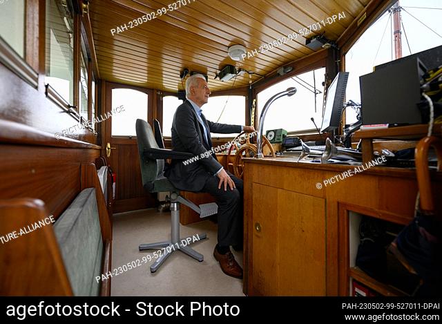 28 April 2023, Saxony, Dresden: Stanislaw Tillich (CDU), former Prime Minister of Saxony, sits at the steering wheel of the historic paddle steamer ""Dresden""...