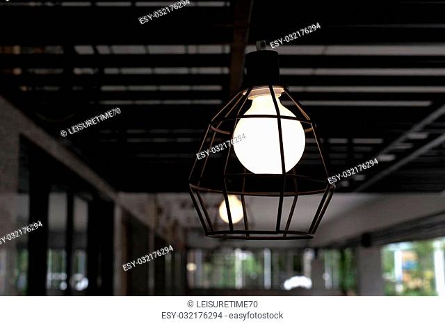 hanging lamp with light bulbs on ceiling