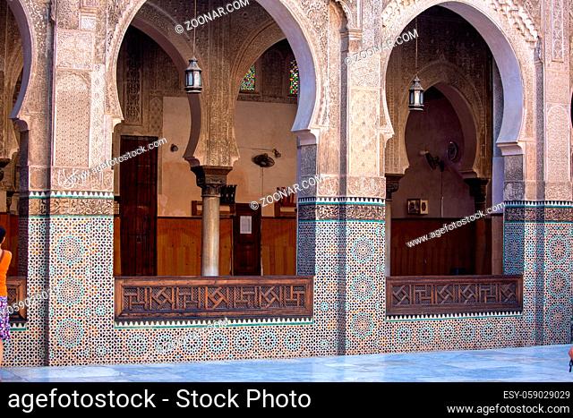 Fez, Morocco-Oct.10, 2019: Famous Bou Inania Madrasa in Fez city, Morocco. It is shown as one of the best sample of madrasa architecture in Morocco