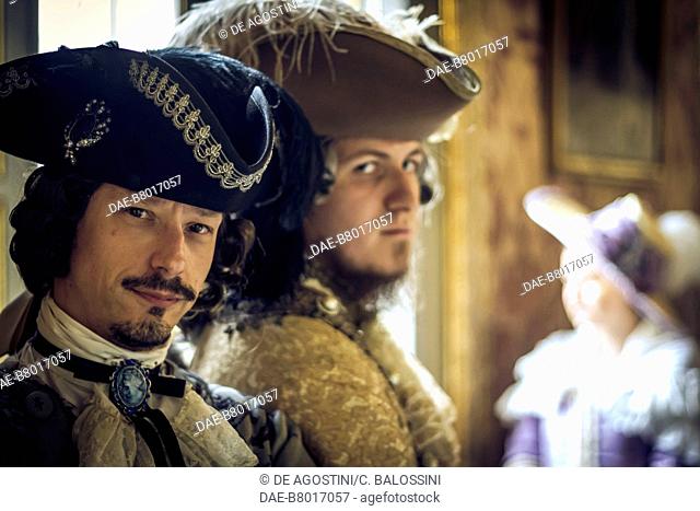 Two nobles wearing tricorn hats, court life in the Stupinigi hunting lodge, Italy, 18th century. Historical re-enactment